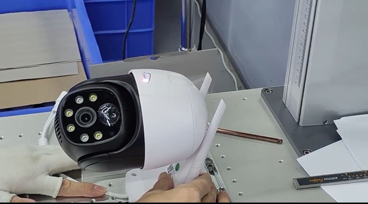 Engineers discussing a custom security camera design